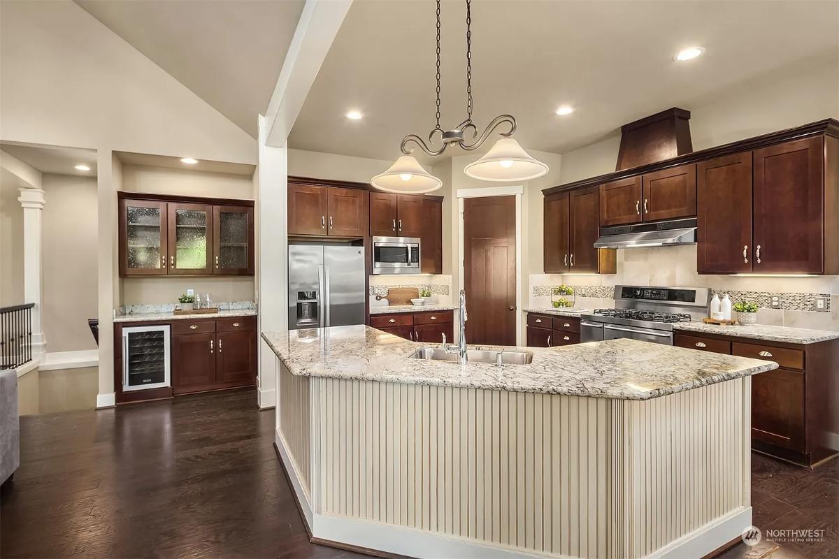 Check Out the Large Granite Island in This Craftsman Kitchen