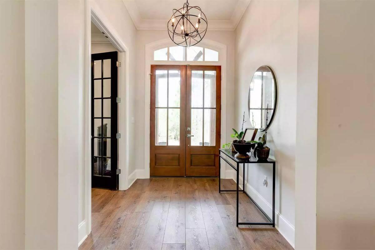 Inviting Entryway with Modern Glass Pendant Lighting
