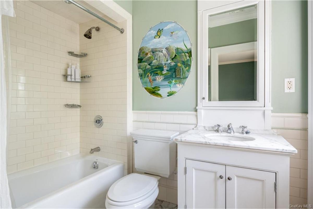 Delight in the Hand-Painted Murals in This Classic Bathroom