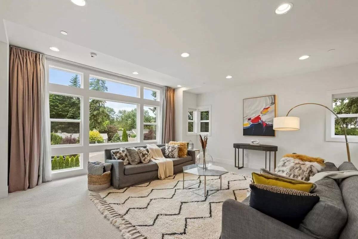 Notice the Plush Textures and Floor-Length Drapes in This Inviting Living Room