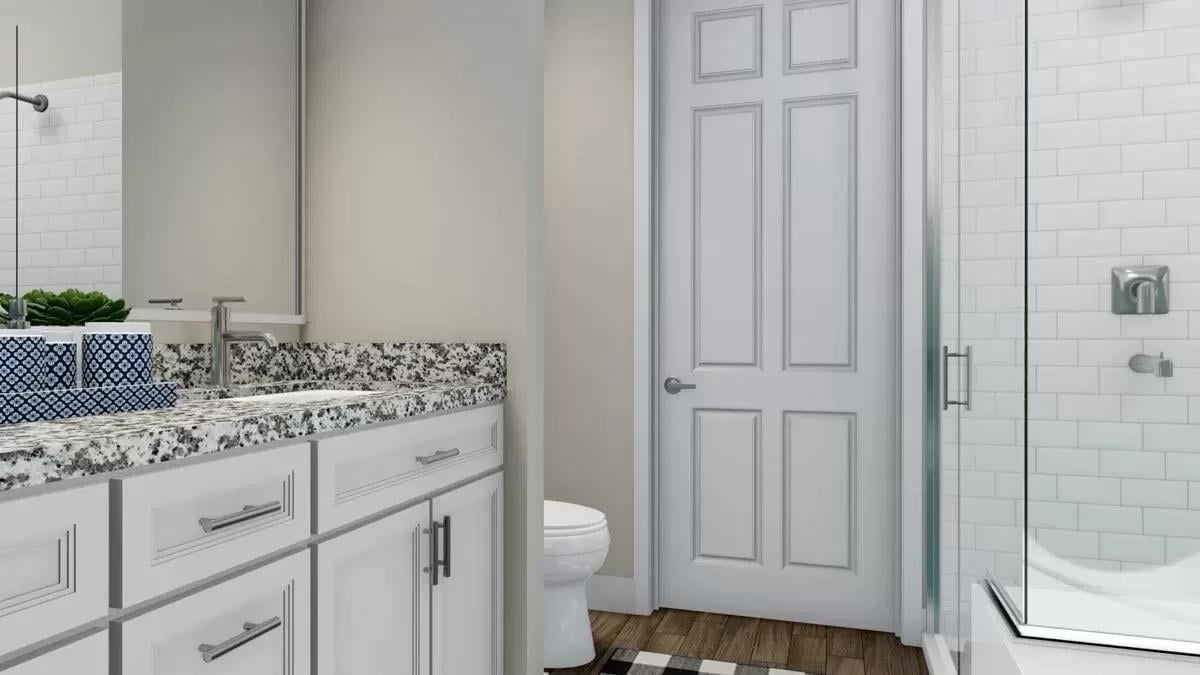 Check Out the Granite Countertops in This Sleek Bathroom