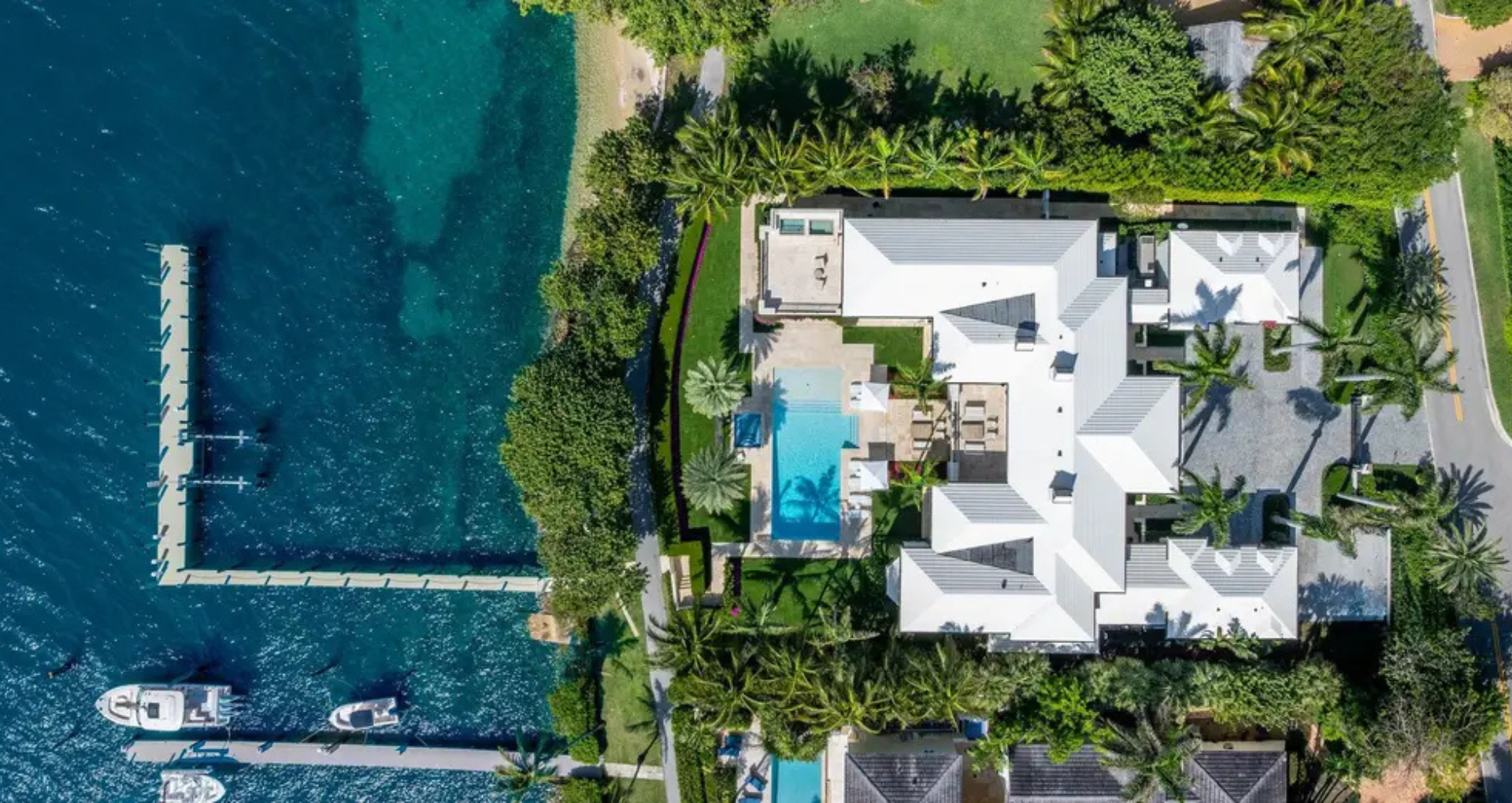 Explore 13,375 Sq. Ft. of Intracoastal Grandeur in This Colonial-Inspired Estate in Palm Beach, FL, Featuring Expansive Views and Deep-Water Dock