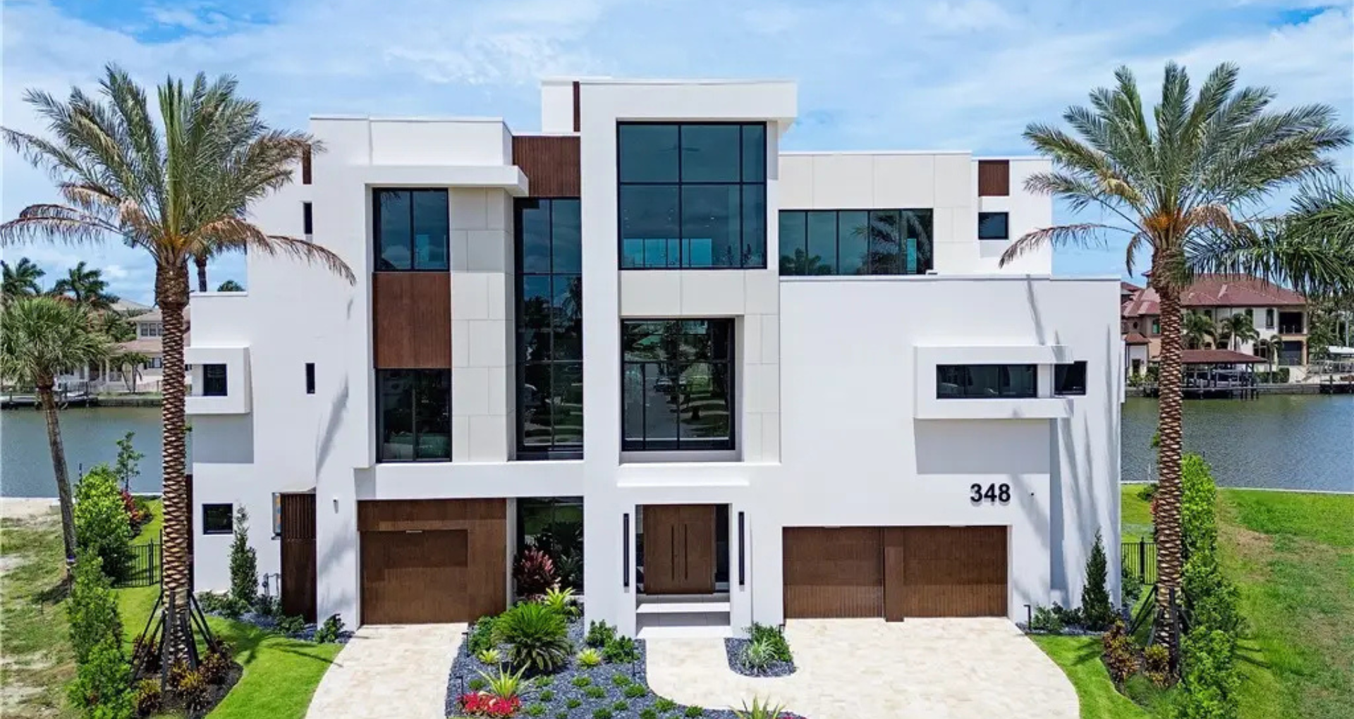 Explore this 5,367 Sq. Ft. Contemporary Waterfront Estate in Naples, Florida, Featuring Elevator, 5-Car Garage and Unforgettable Sunsets