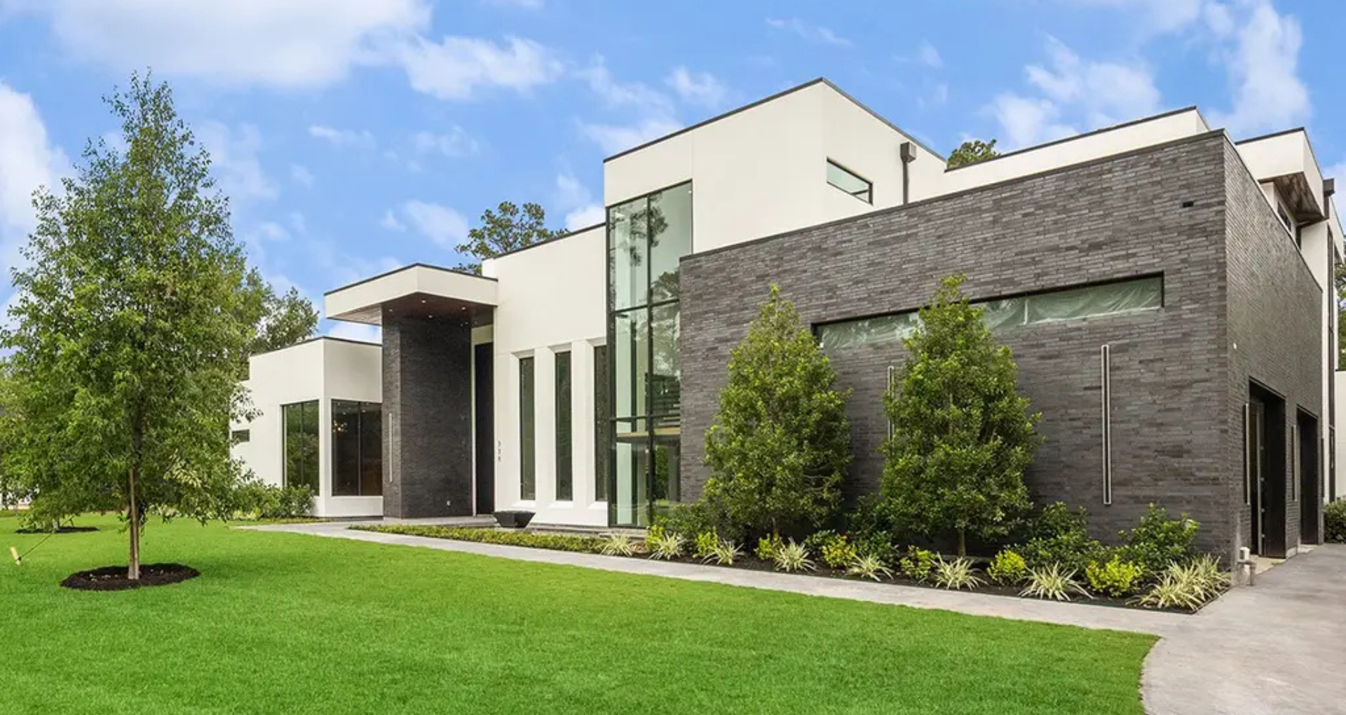 Explore 14,630 Sq. Ft. of Modern Luxury in Bunker Hill Village, Texas, Featuring Dual Kitchens, Elevator, and Resort-Style Pool Area