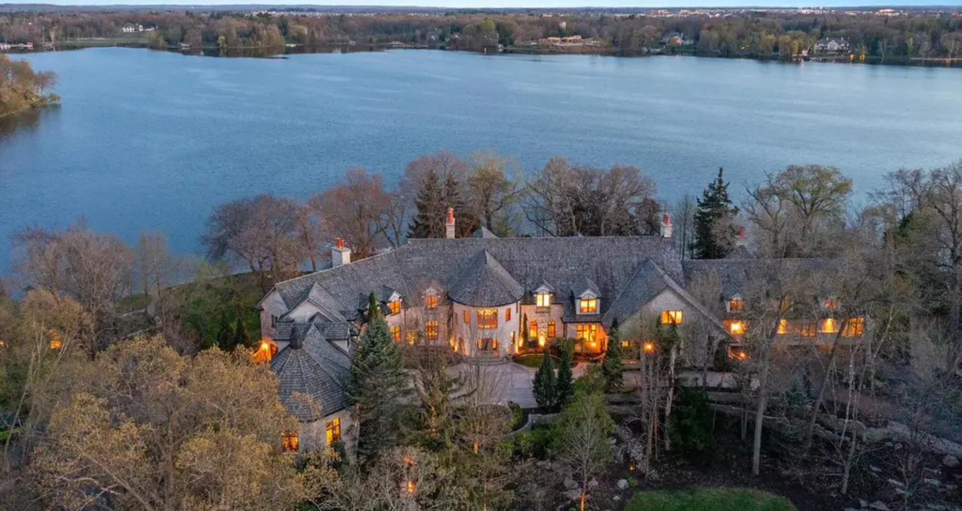 Explore 20,890 Sq. Ft. of Iconic Lakefront Living in Oconomowoc, Wisconsin Featuring the Ultimate in Refined Luxury