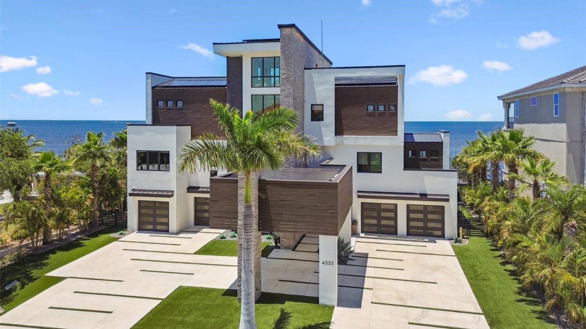 Explore this 5,390 Sq. Ft. Waterfront Mansion in Port Richey, Florida, Featuring Seamless Indoor-Outdoor Living with Direct Gulf Access
