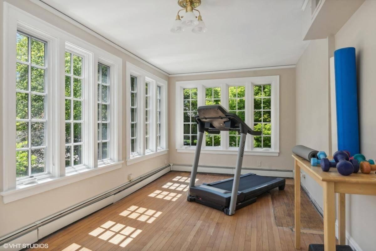 Home Gym with Sunlit Views and Practical Setup