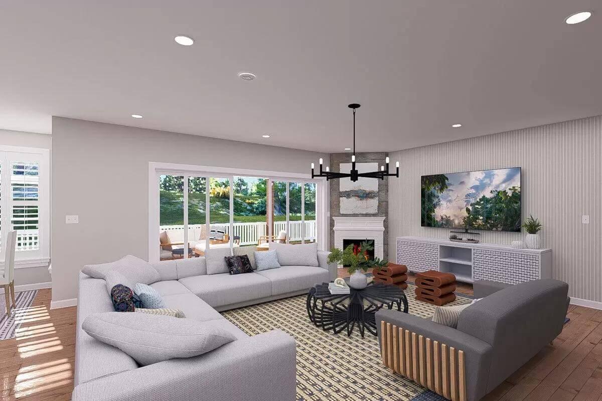 Wow, Look at the Expansive Sectional in this Bright Living Room