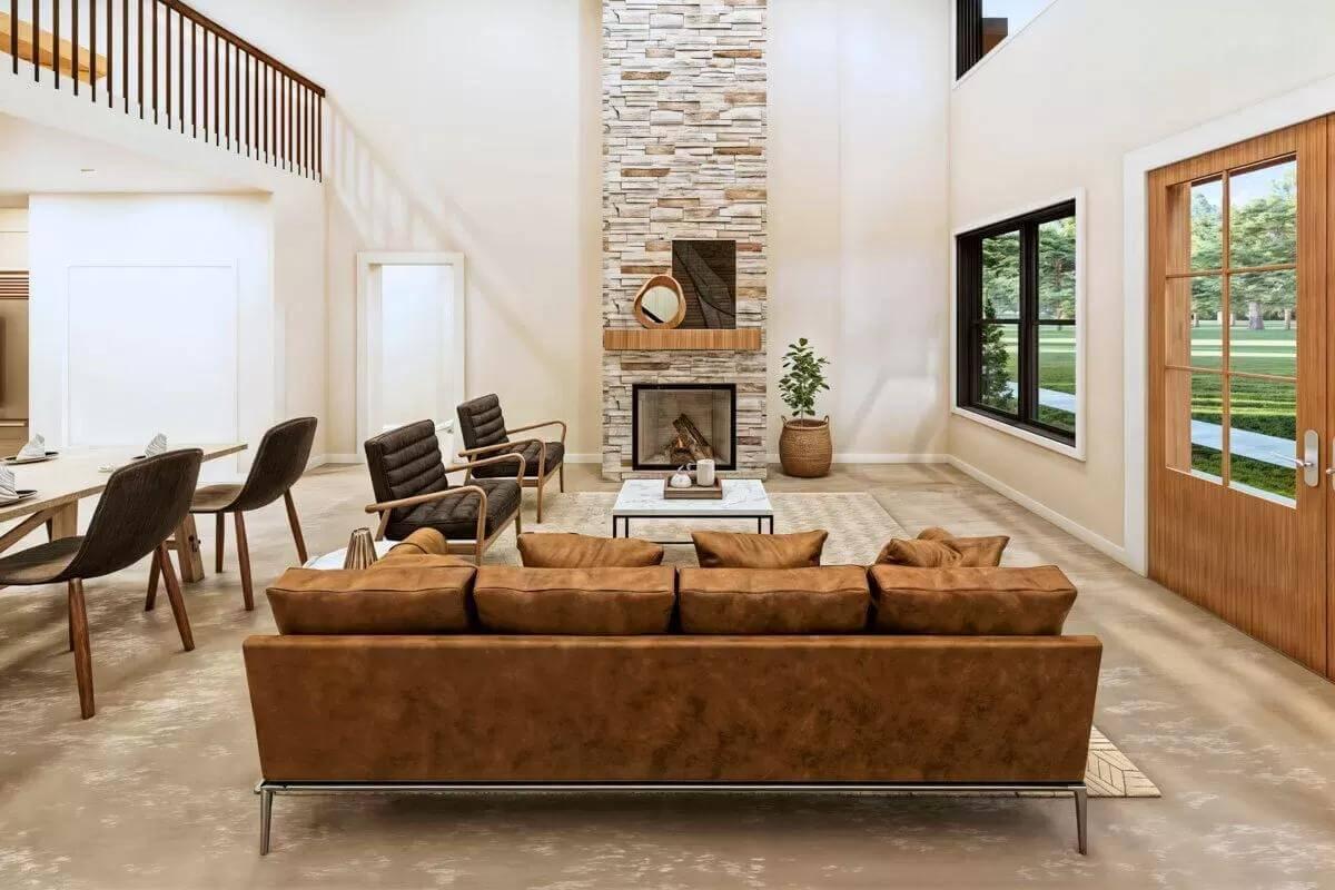 Take In This Elegant Living Room with a Tall Stone Fireplace