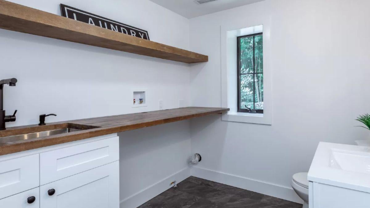 Minimalist Laundry Room with Rustic Wood Accents