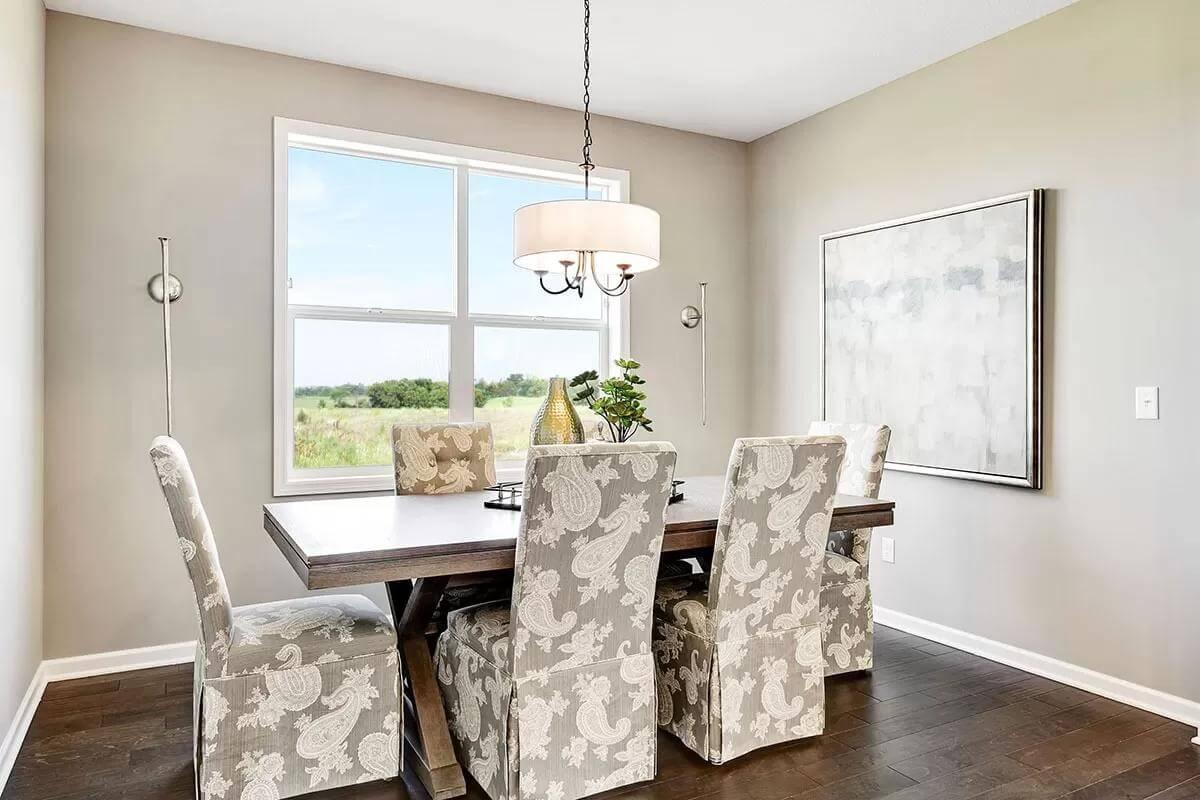 Effortless Elegance in a Neutral Dining Room with Geometric Chandelier