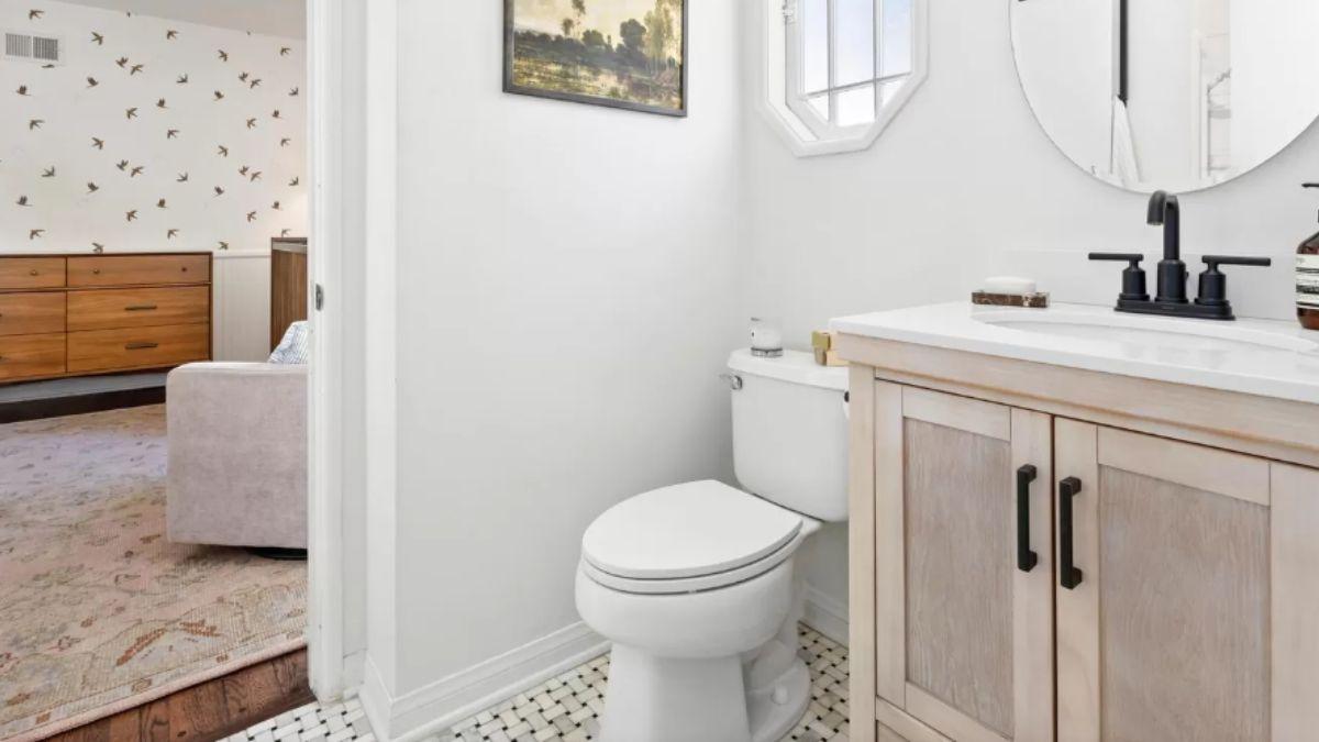 Notice the Hexagonal Window in This Charming Powder Room