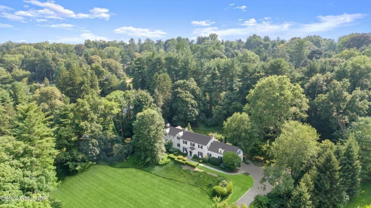 Stately Colonial Home Nestled in Verdant Woodlands