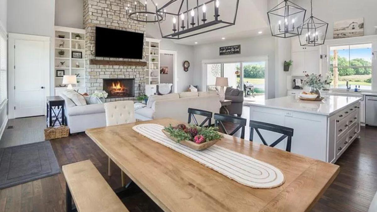 Rustic Living Space with Stone Fireplace and High Ceilings