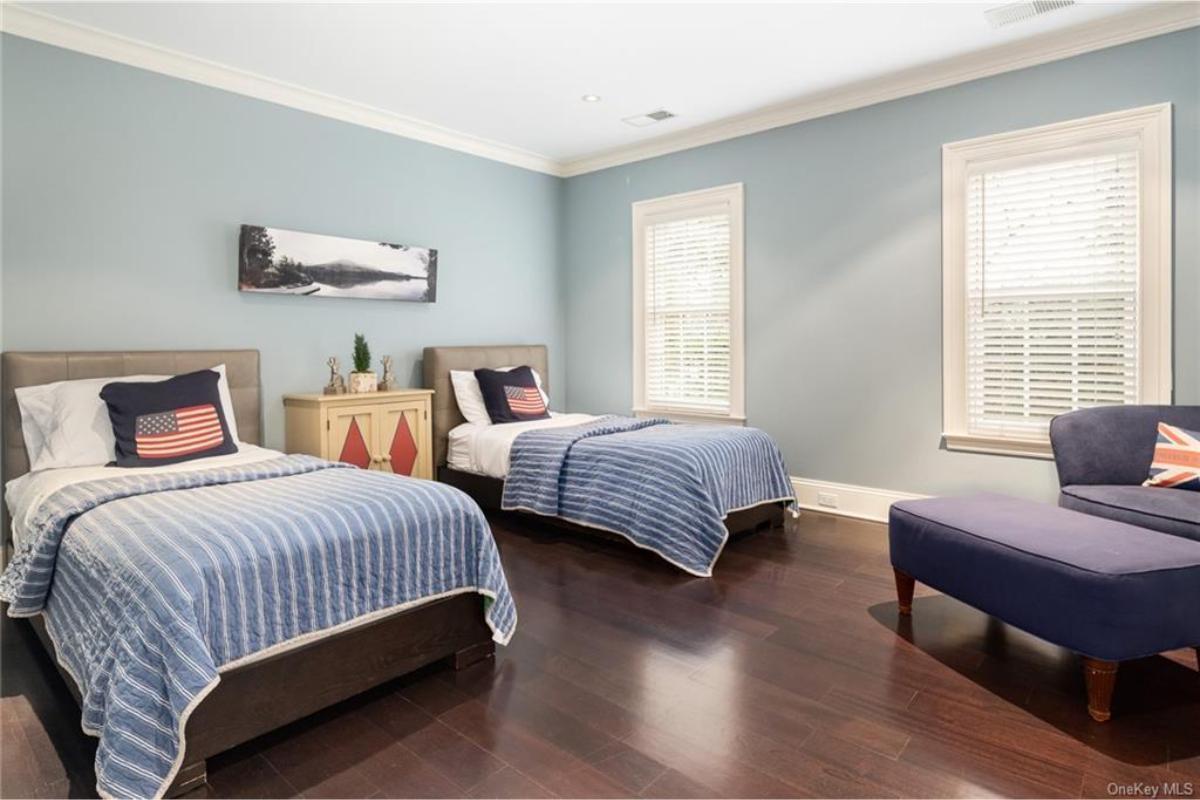 Twin Bedroom with Nautical Touches and Bright Accents