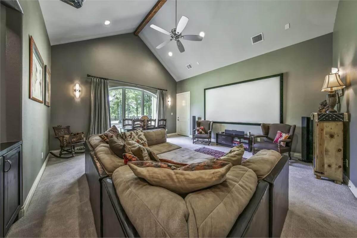 Step into This Cozy Home Theater with Craftsmanship Details