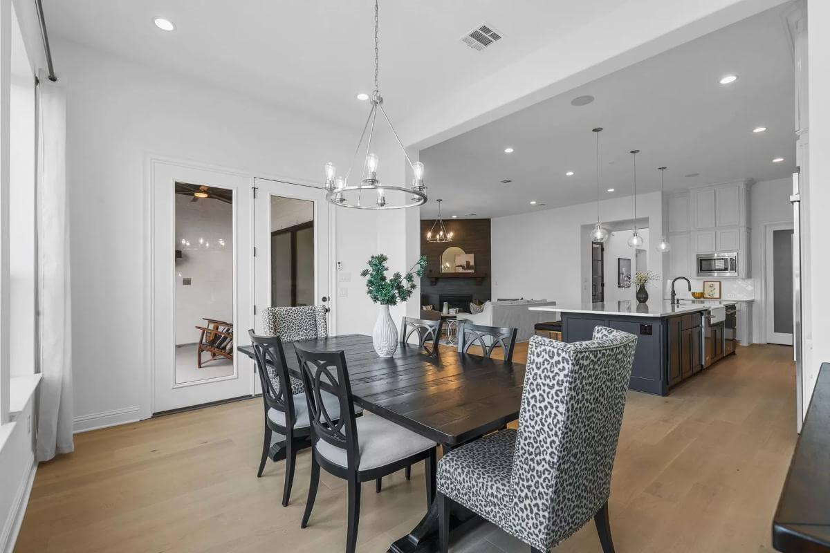 Notice the Playful Chairs in This Open Dining and Kitchen Space