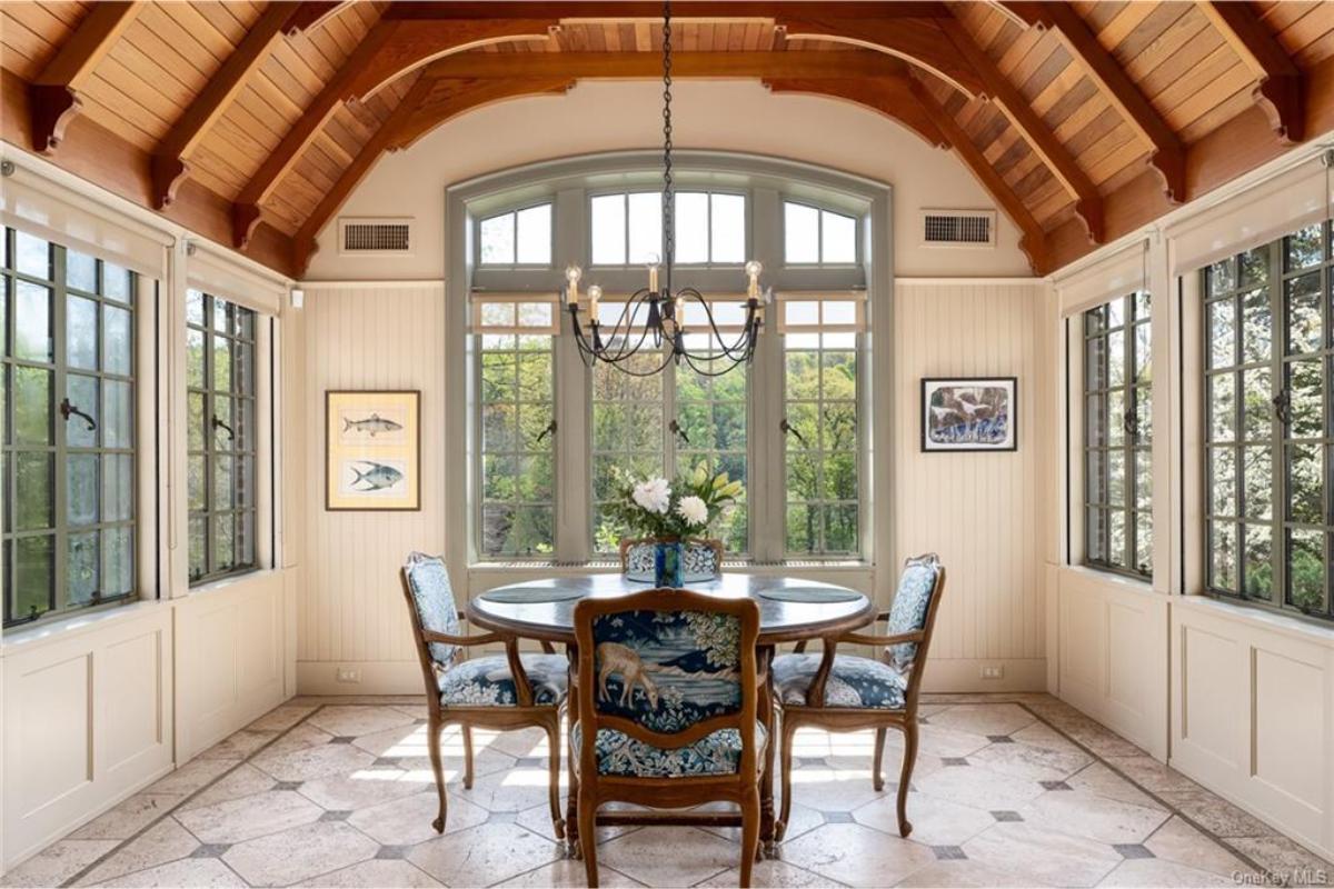 Notice the Vaulted Ceiling Adding Character to This Sunlit Dining Nook