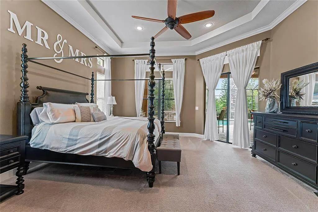 Elegant Master Bedroom with a Hint of Poolside Luxury