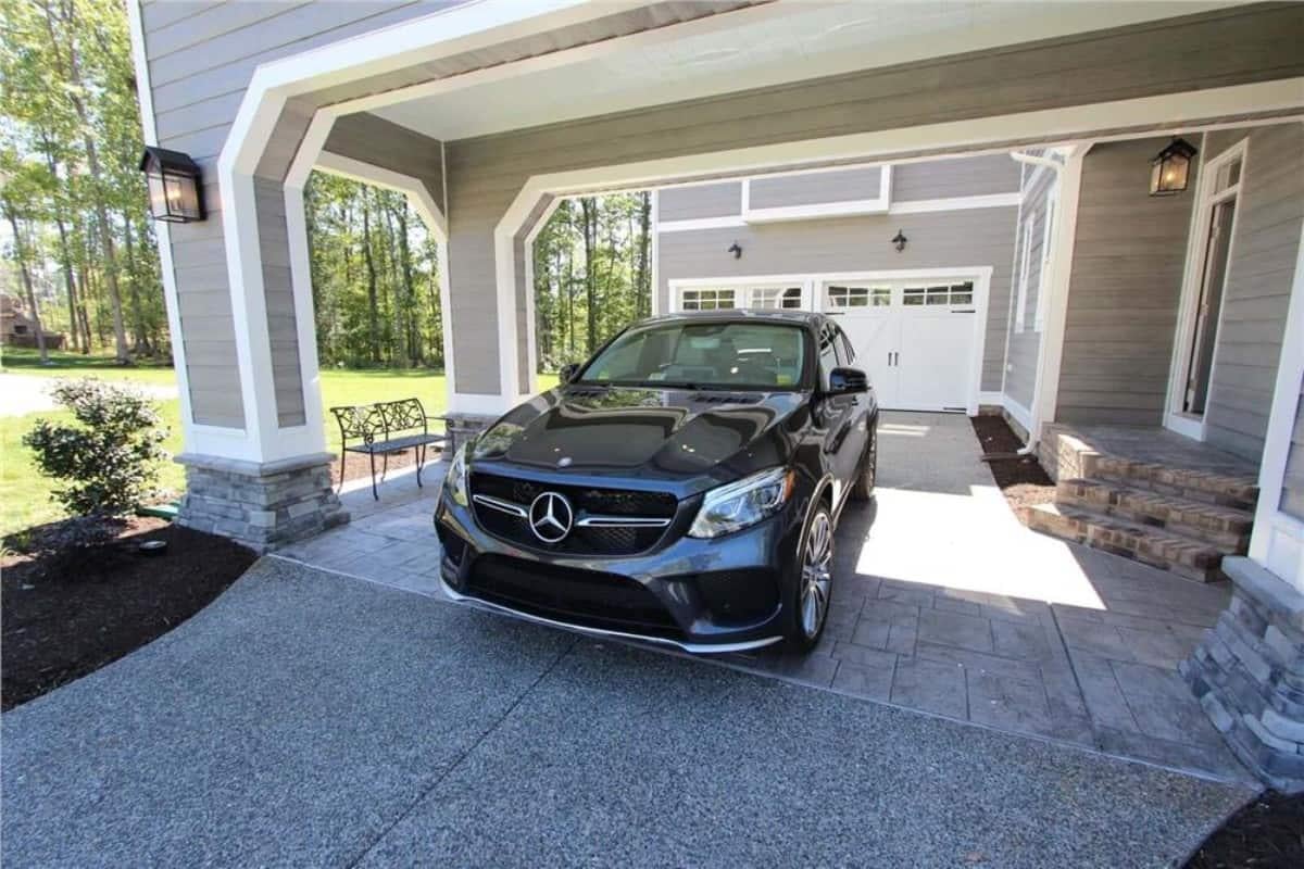 Explore the Practicality and Style of the Covered Carport in This Craftsman Home