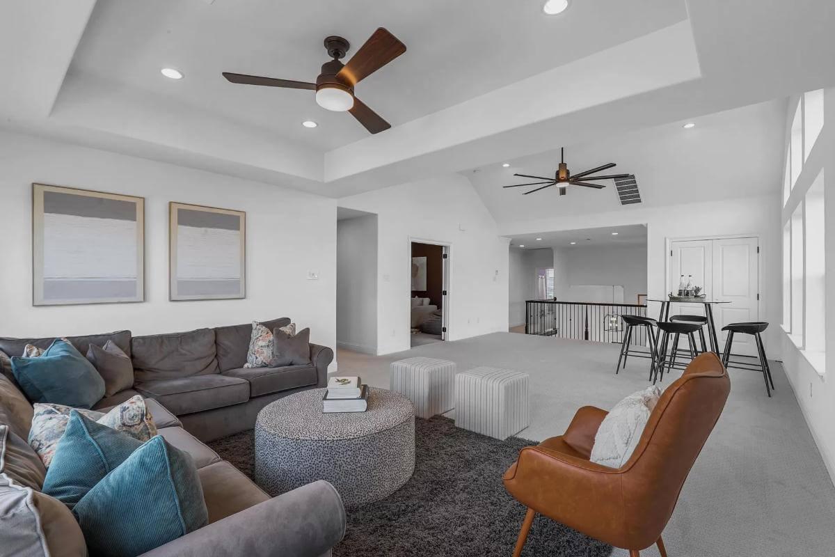 Check Out This Multifunctional Loft with Stylish Ceiling Fans