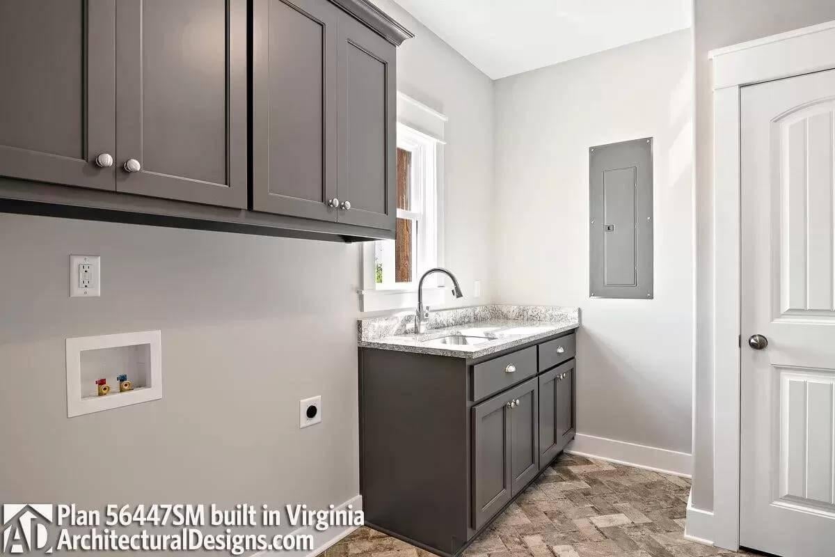 Check Out the Elegant Gray Cabinetry in This Functional Laundry Room