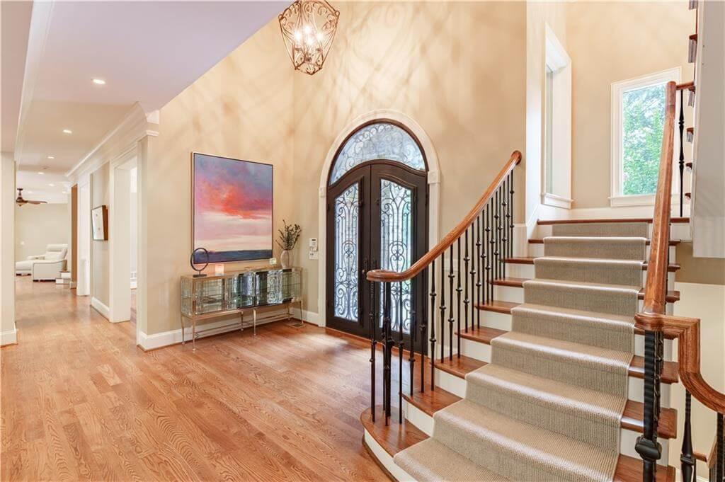 Wow, Notice the Elegant Curved Staircase and Artful Entry