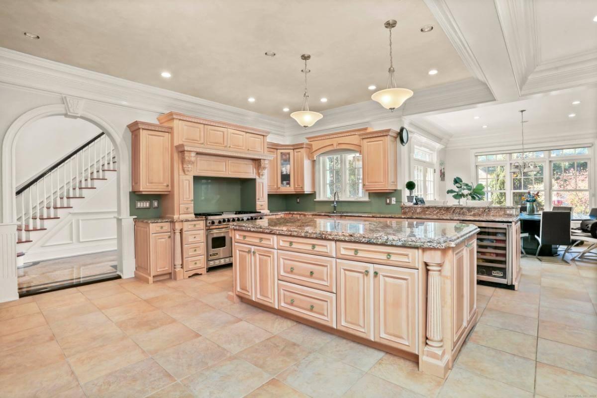 Check Out the Stately Columns and Classic Details in This Spacious Kitchen