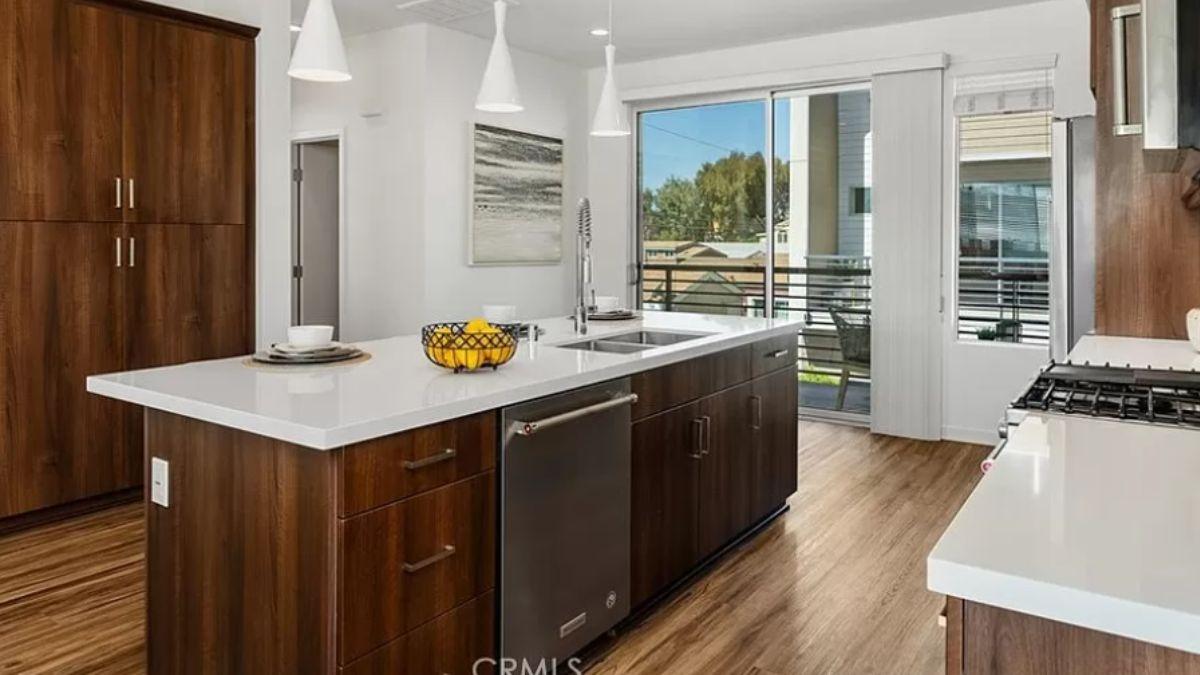 Wow, Check Out the Sleek Quartz Countertops and Balcony Access
