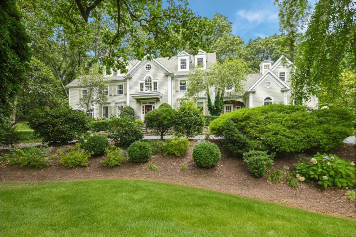Classic Colonial Elegance with a Verdant Front Garden