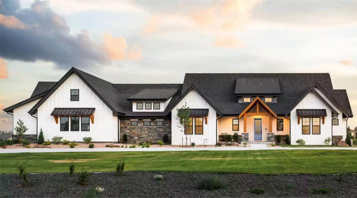 Modern Farmhouse with Striking Gable Roof and Stone Accents