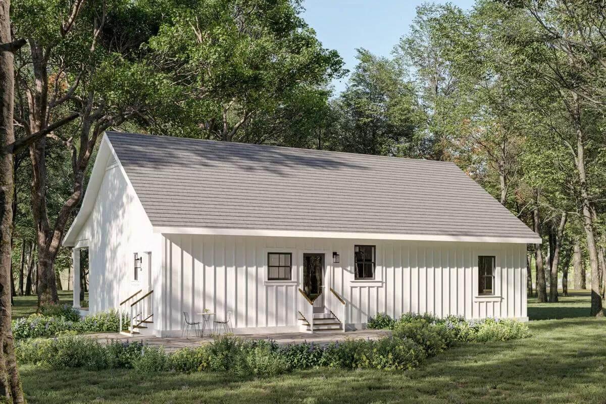 Charming White Cottage Nestled in the Woods