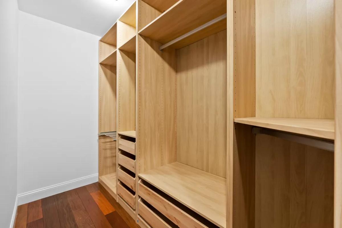 Wow, Look at This Sleek Walk-in Closet with Efficient Shelving