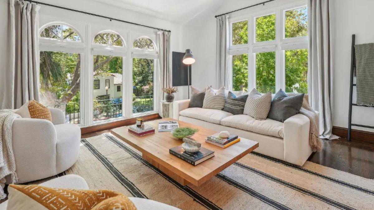 Feel the Calm in This Living Room with Striking Arched Windows and Layered Textures