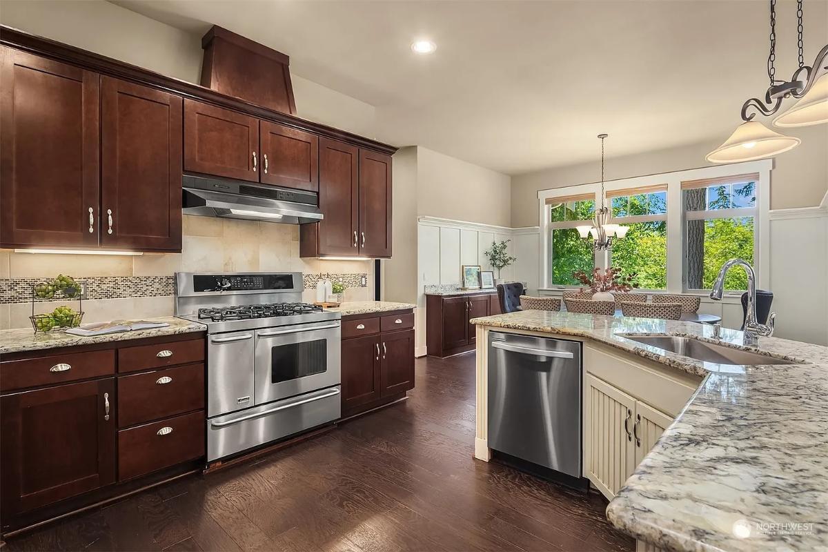 Explore This Spacious Craftsman Kitchen with Granite Countertops