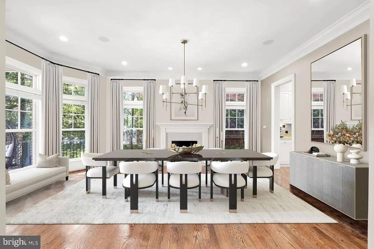 Elegant Dining Room with a Modern Chandelier and Fireplace