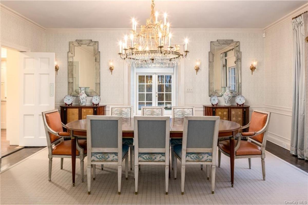 Elegant Dining Room with a Grand Chandelier as the Focal Point