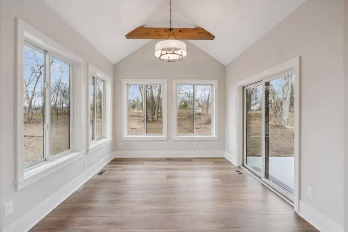 Embrace the Natural Views from This Sunroom Oasis