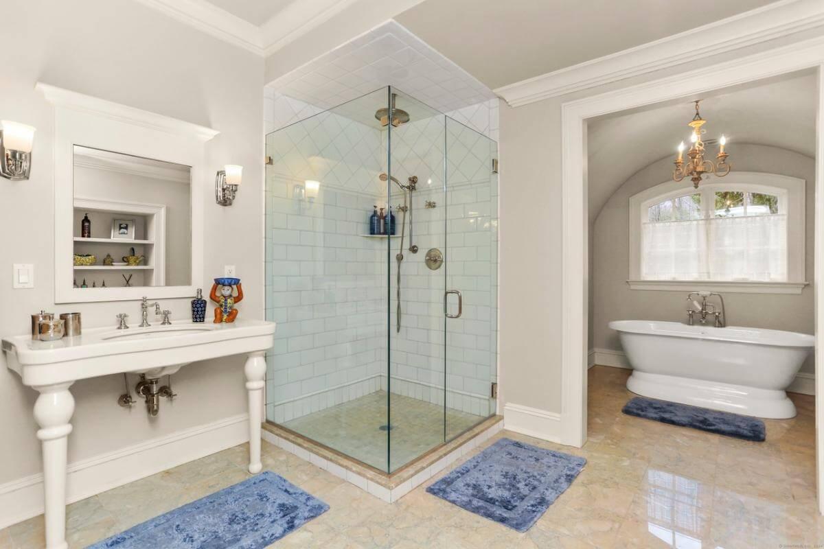 Step Into This Elegant Bathroom with Freestanding Tub and Glass Shower
