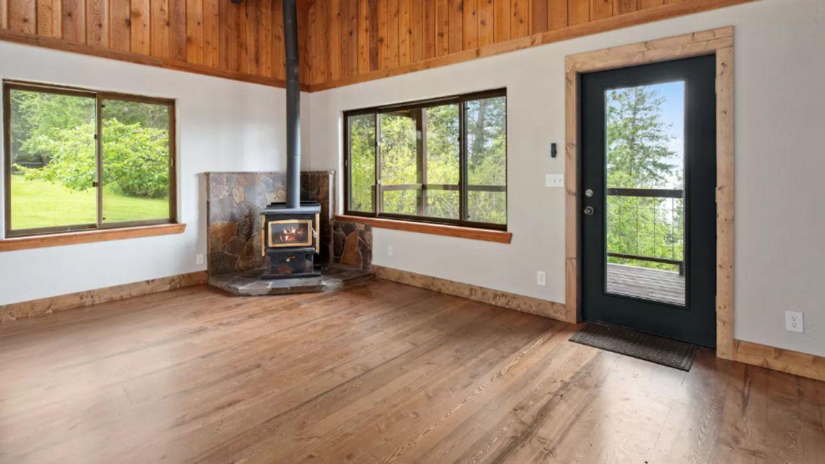 Warm Corners with a Wood Stove and Scenic Windows