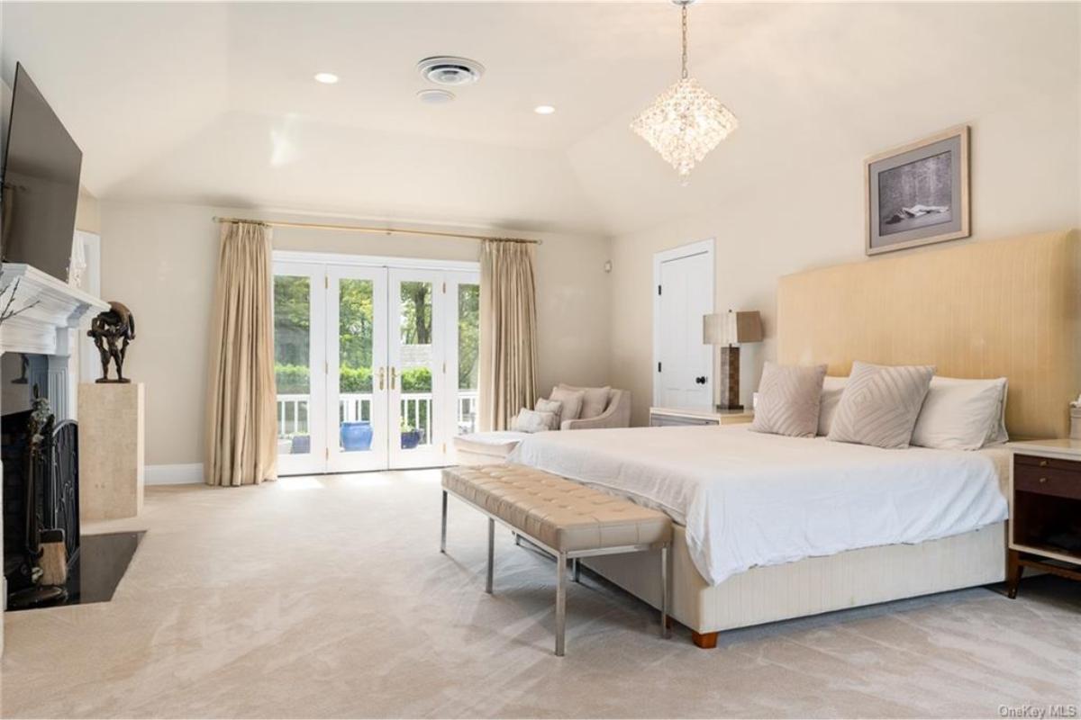 Relaxing Master Suite with French Doors to the Patio
