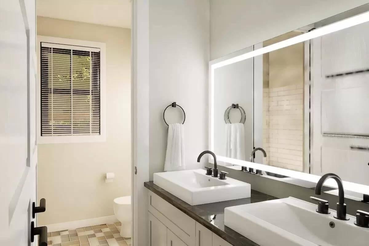 Notice the Sleek Double Sinks in This Modern Bathroom
