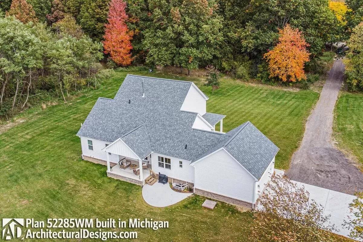 Explore the Expansive Backyard of This Idyllic Farmhouse