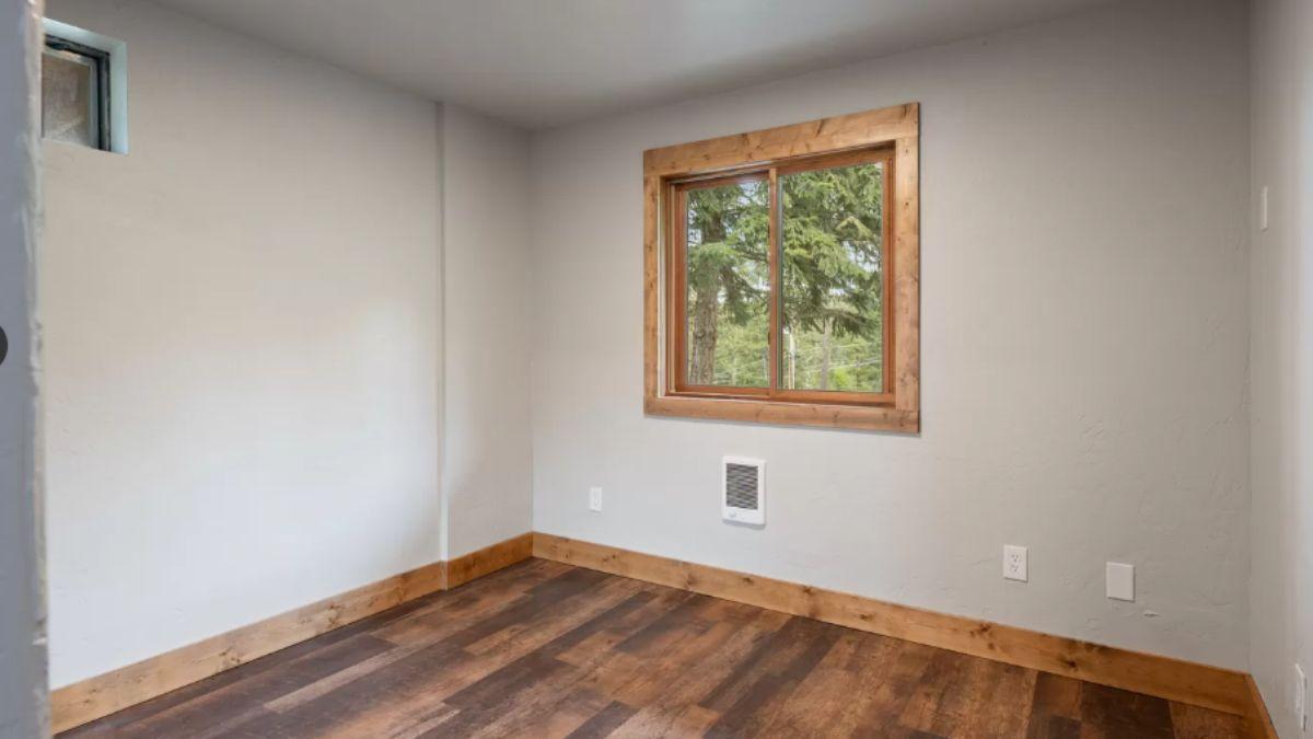 Simple Retreat Awaits with Natural Wood Trim Accents
