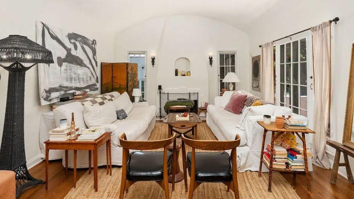Cozy Living Room with Unique Art and Ambient Lighting