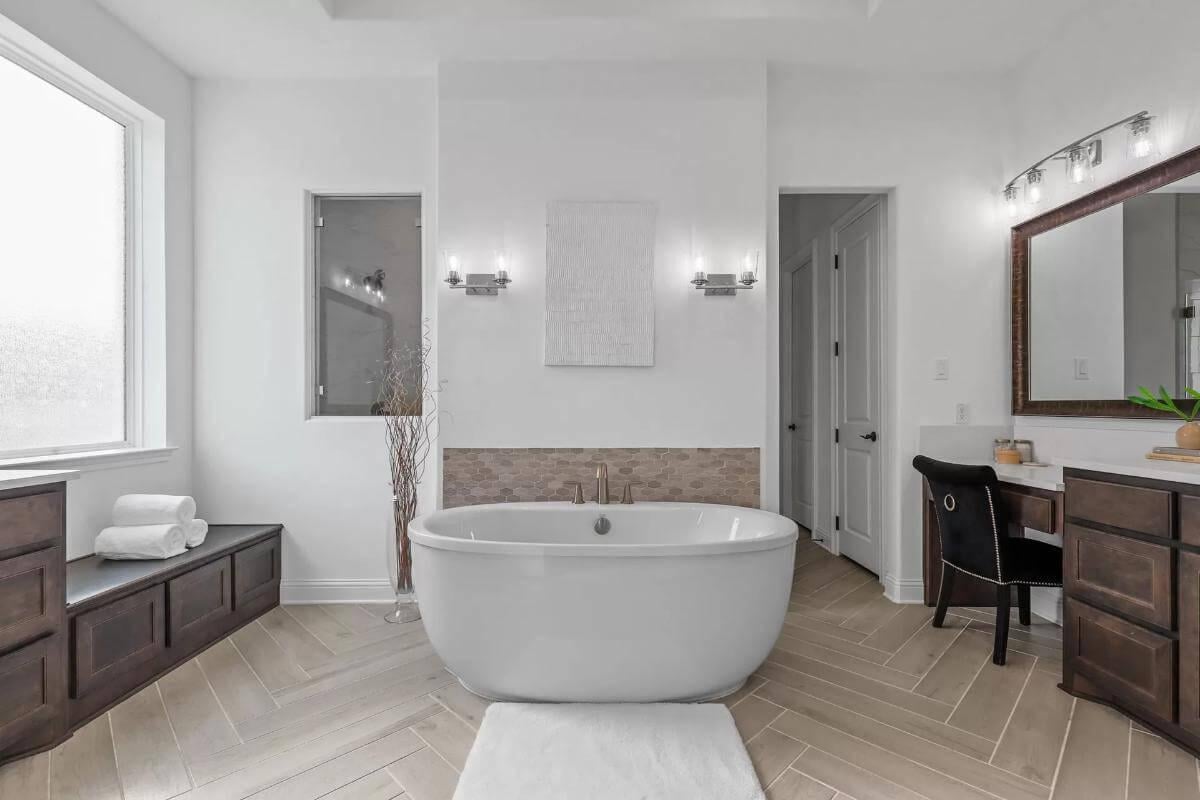Notice the Freestanding Tub as the Centerpiece of This Refined Bathroom