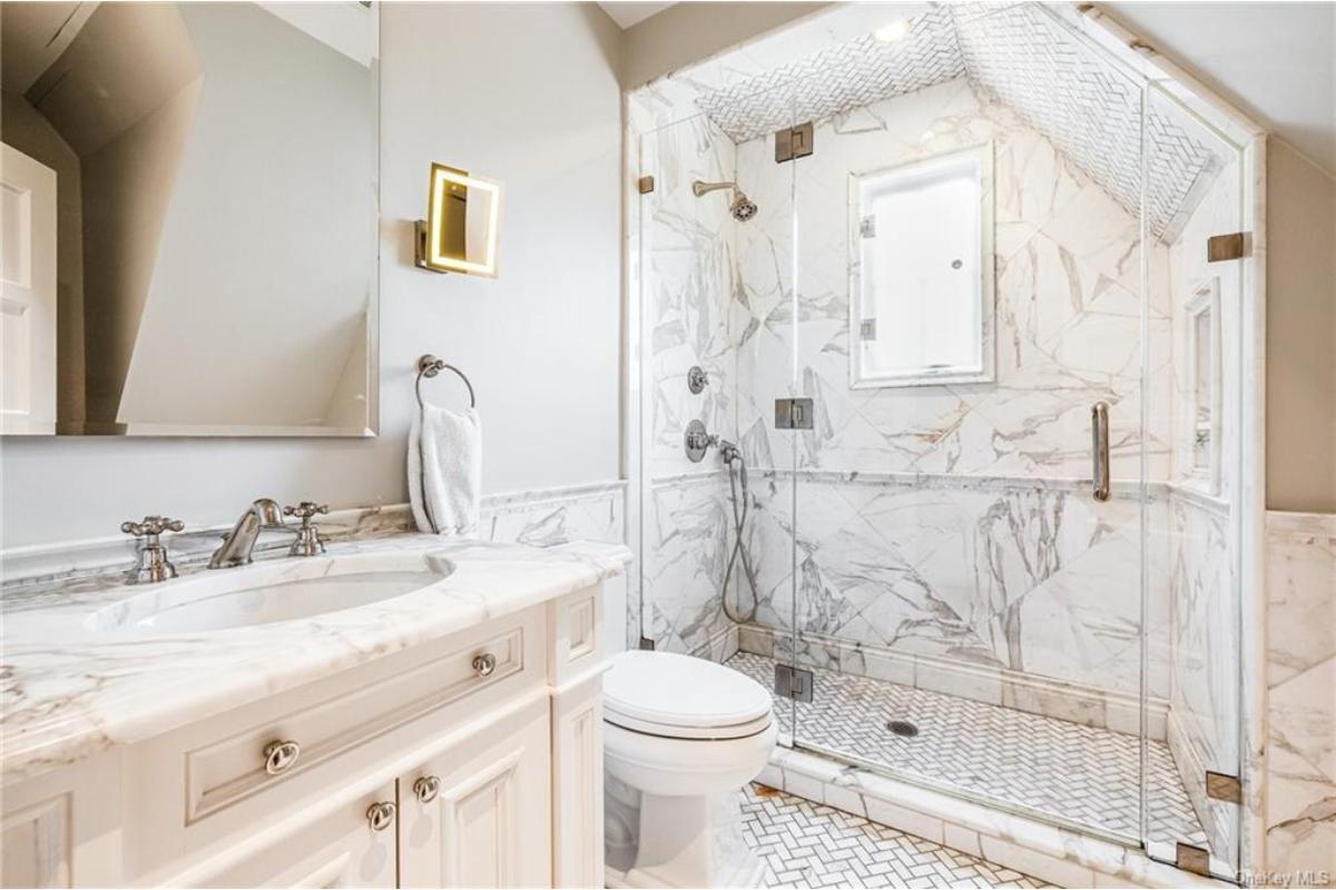 Notice the Marble Marvel in This Bright Bathroom