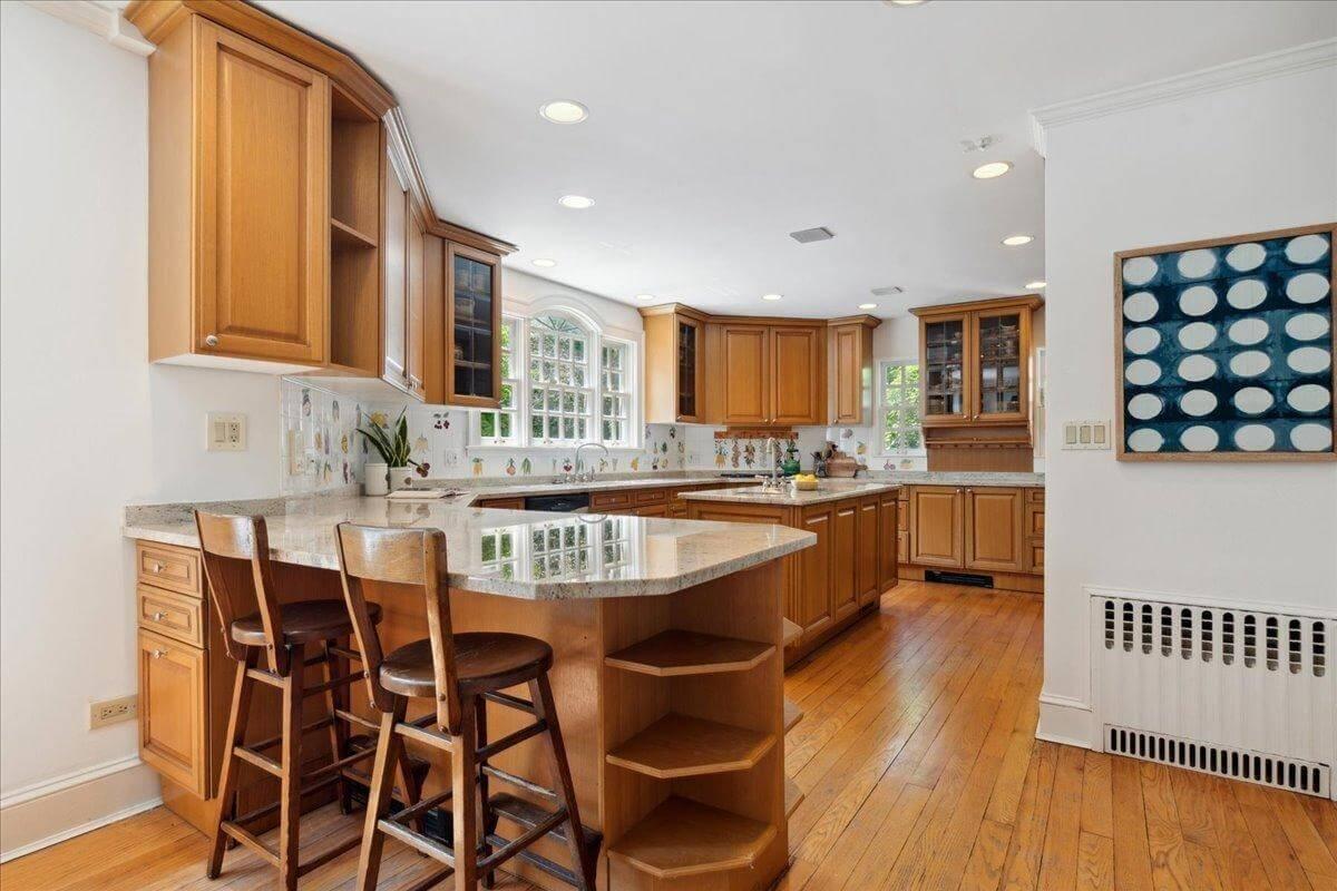 Notice the Curved Corner Cabinetry in This Traditional Kitchen