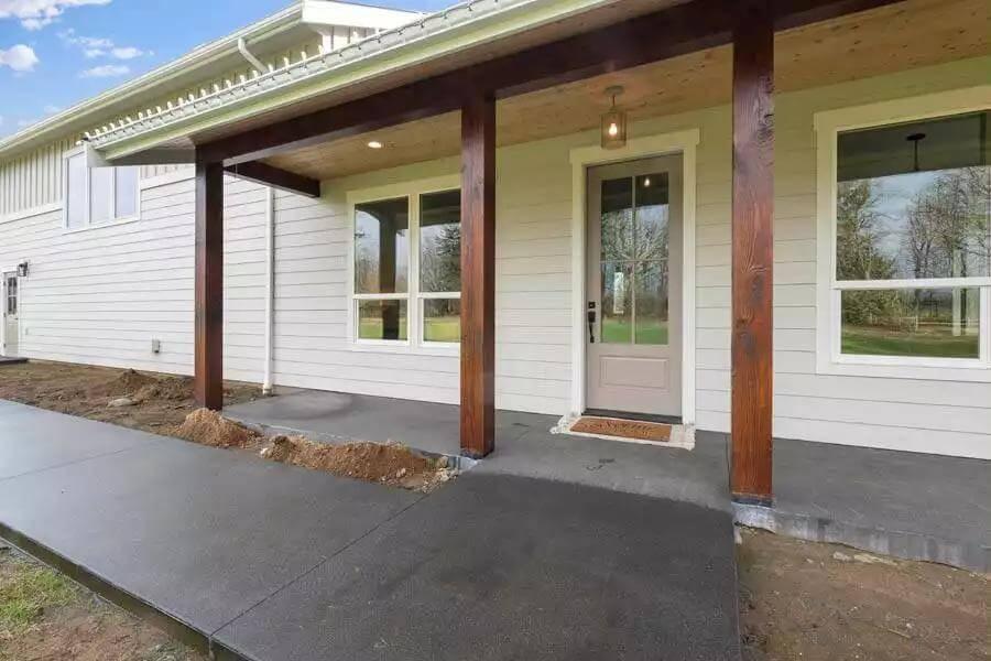 Welcoming Entryway with Sturdy Timber Columns