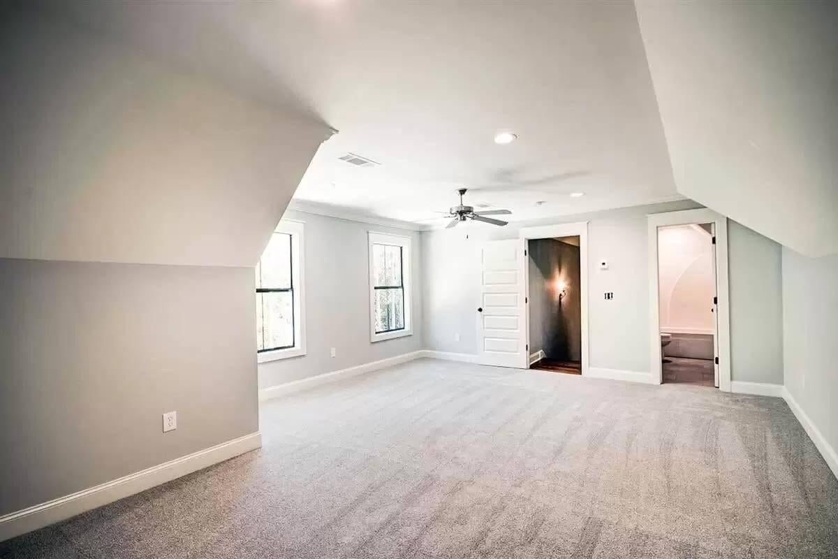 Explore This Versatile Attic Space with Dormer Windows